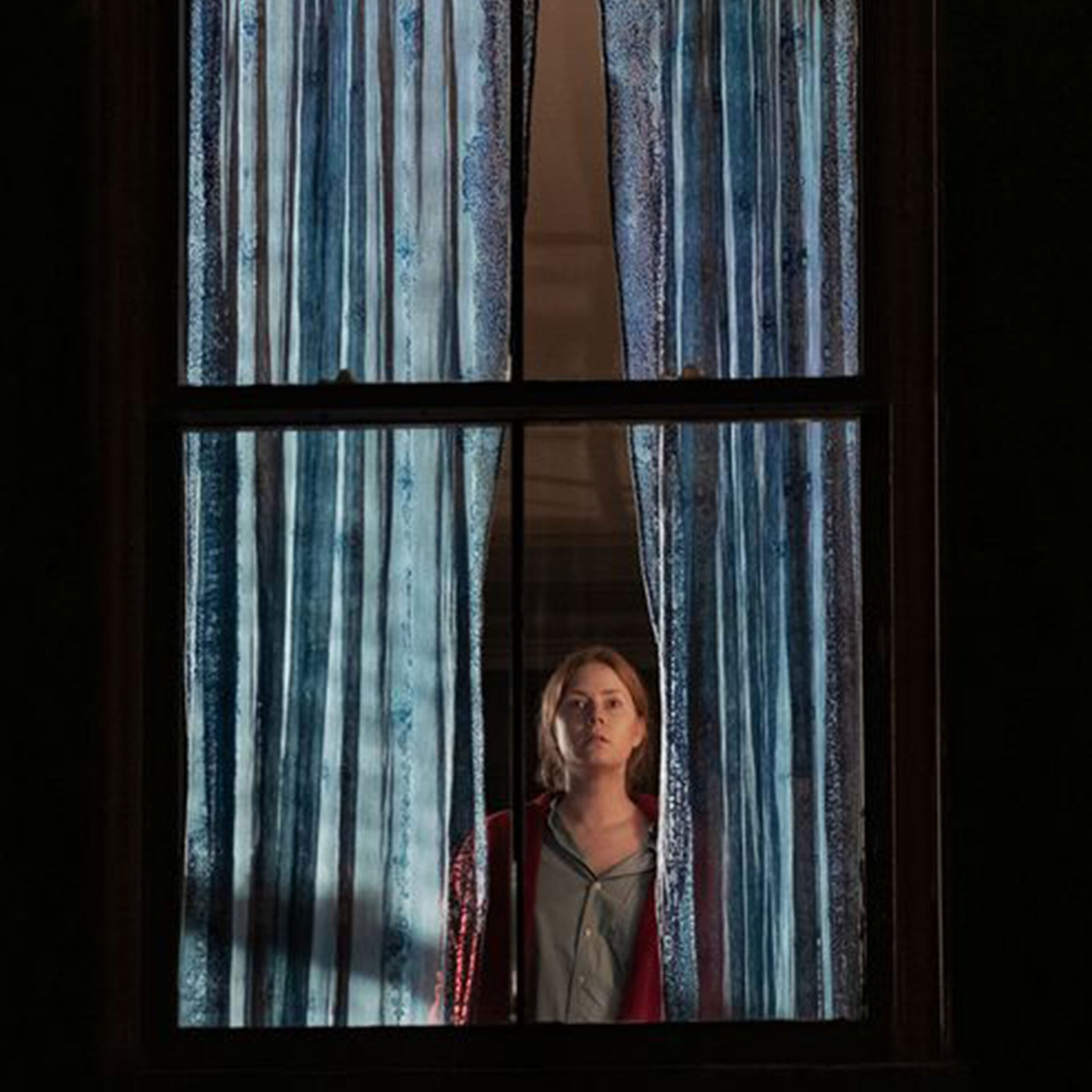 La mujer en la ventana